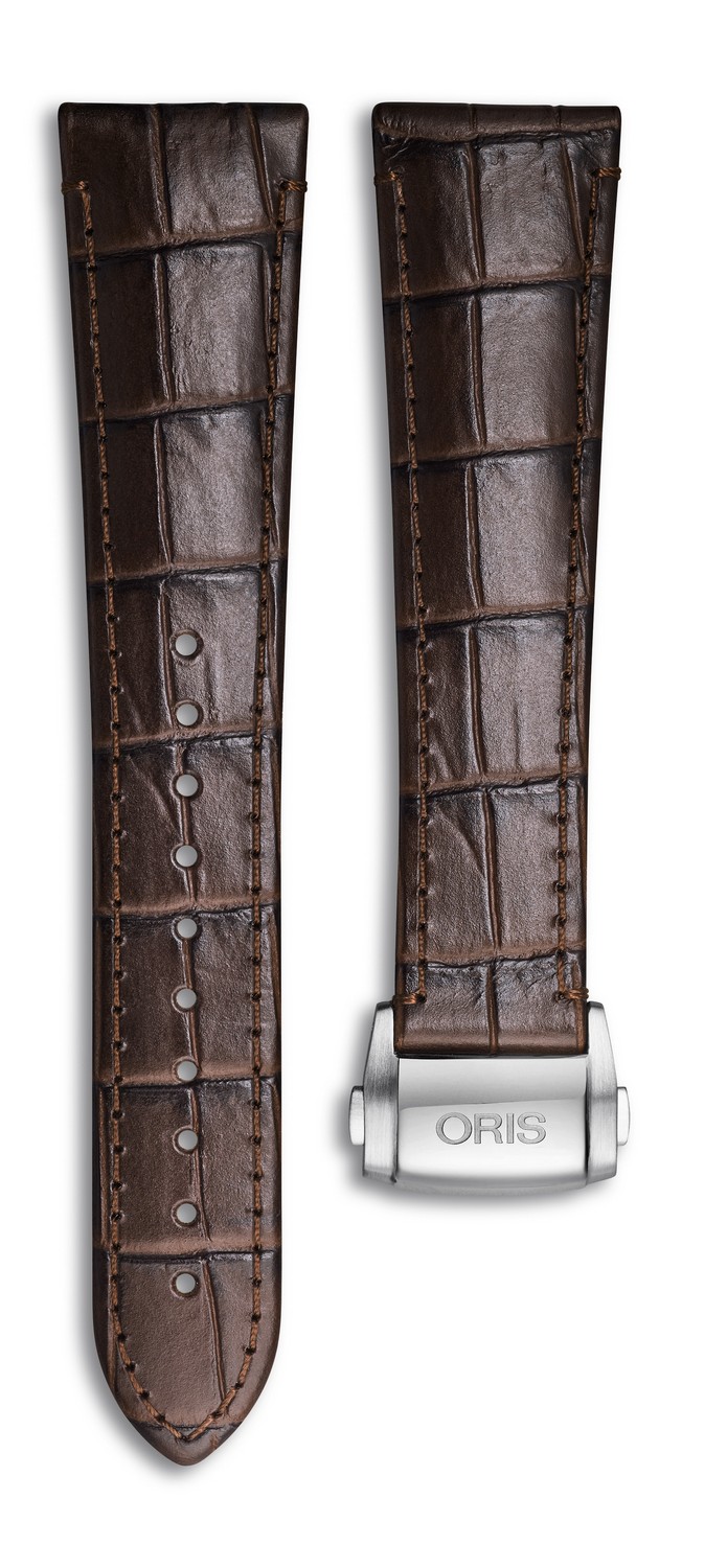Ремешок для часов Oris из натуральной кожи, коричневый, с застежкой Кожаные ремешки - стильные, надёжные и долговечные, способные составить достойную пару часам со стальным корпусом или часам из титана. Аксессуары из кожи не рекомендуется использовать в воде. У нас присутствуют только высококачественные материалы и оригинальный товар от производителя